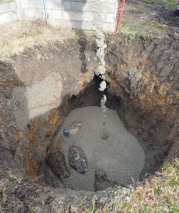 Rive de Gier - Traitement désordre 2 – Mise en place des enrochements percolés au béton
