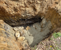 Mise en place d’enrochements percolés au béton liquide en fond de fouille